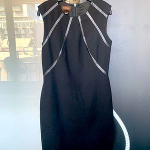 Black sleeveless Danier dress with leather detail